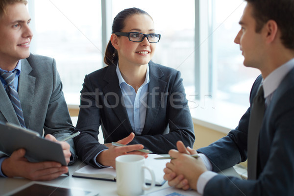 Entrevue image deux écouter jeune homme [[stock_photo]] © pressmaster