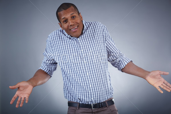 Bizonytalanság kép fiatal afrikai férfi kifejez Stock fotó © pressmaster