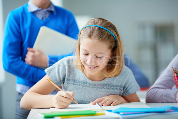 Menina desenho retrato diligente lição estudante Foto stock © pressmaster