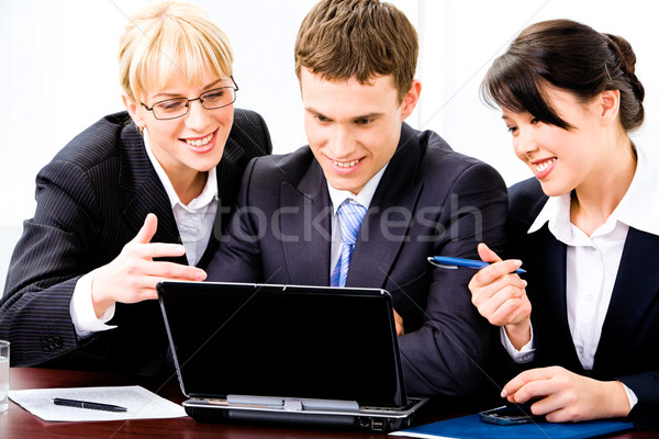 Echipa de afaceri trei persoane afaceri om Reuniunea Imagine de stoc © pressmaster