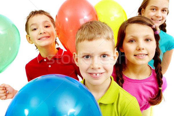 Infantile festival ritratto bambini palloncini guardando Foto d'archivio © pressmaster