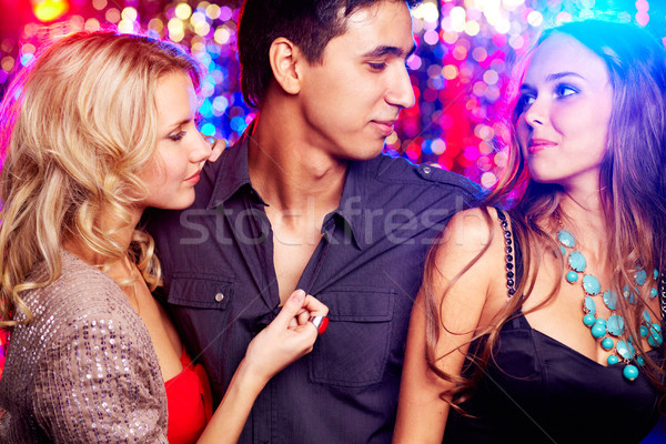 довольно женщины внимание красивый парень вечеринка Сток-фото © pressmaster