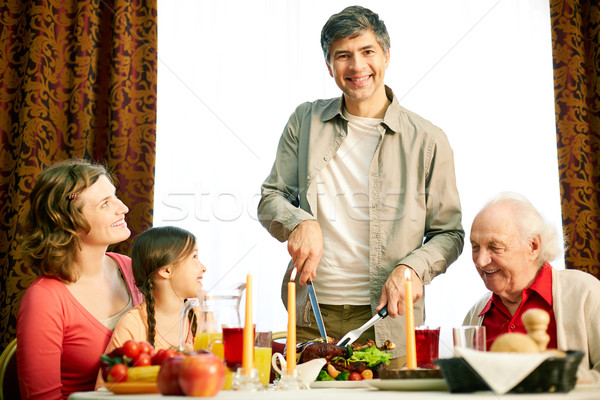 Together at festive table Stock photo © pressmaster