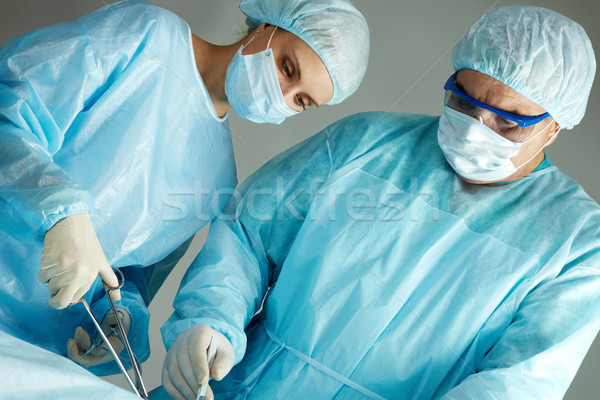 [[stock_photo]]: équipe · chirurgiens · chirurgien · infirmière · homme · médecin