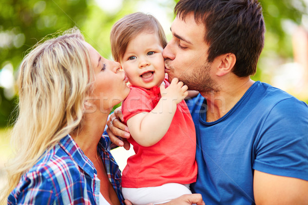 Affection soigneux parents baiser faible [[stock_photo]] © pressmaster