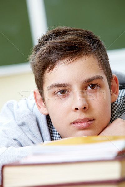 Adolescente estudante retrato inteligente rapaz escuta Foto stock © pressmaster