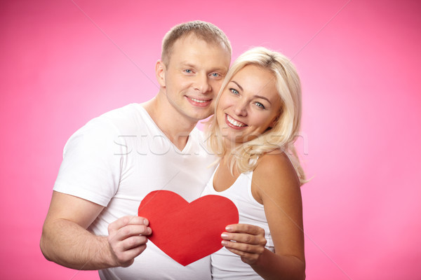 Odaadás portré boldog pár mutat piros Stock fotó © pressmaster