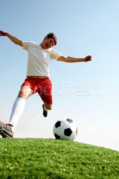 Foto stock: Jogar · futebol · retrato · jogador · de · futebol · bola