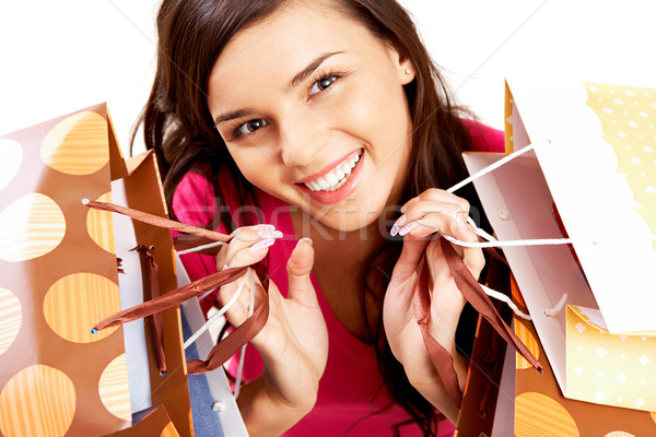 Vásárlás portré boldog lány színes papírzacskók néz Stock fotó © pressmaster