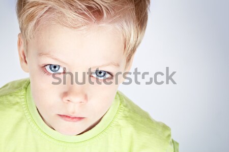 Azul nino primer plano retrato encantador cara Foto stock © pressmaster