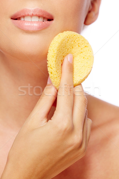 Cara higiene mulher limpeza esponja mão Foto stock © pressmaster