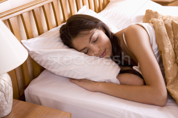 Belle dormir belle femme dormir lit femme Photo stock © pressmaster