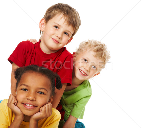 Boldog barátok portré három gyerekek néz Stock fotó © pressmaster