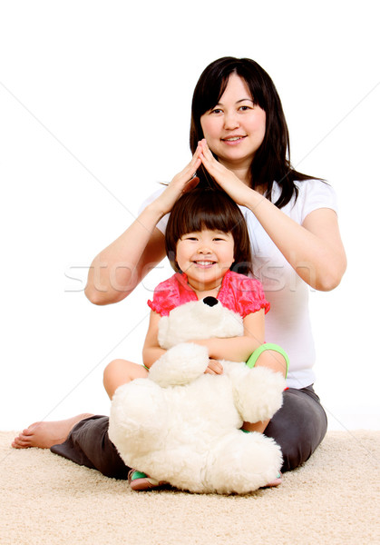 Cuidar cuidadoso mãe mãos forma casa Foto stock © pressmaster