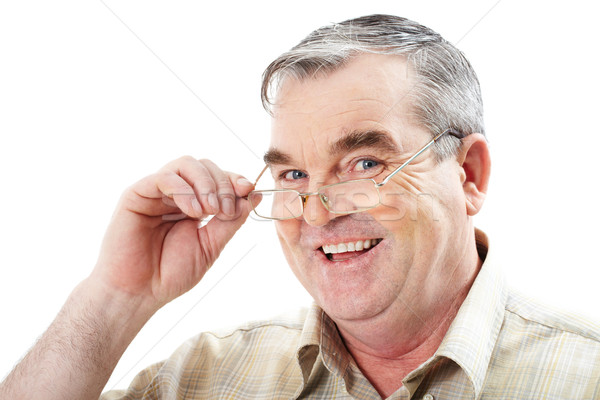 Dojrzały mężczyzna twarz okulary patrząc kamery szczęśliwy Zdjęcia stock © pressmaster