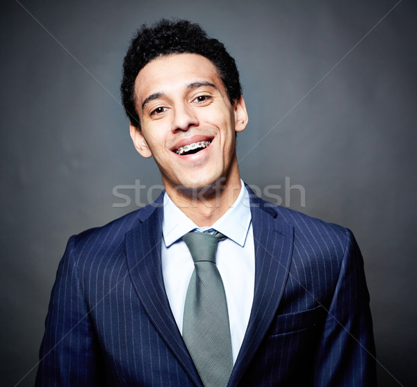 Negocios tipo tirantes retrato alegre negro Foto stock © pressmaster