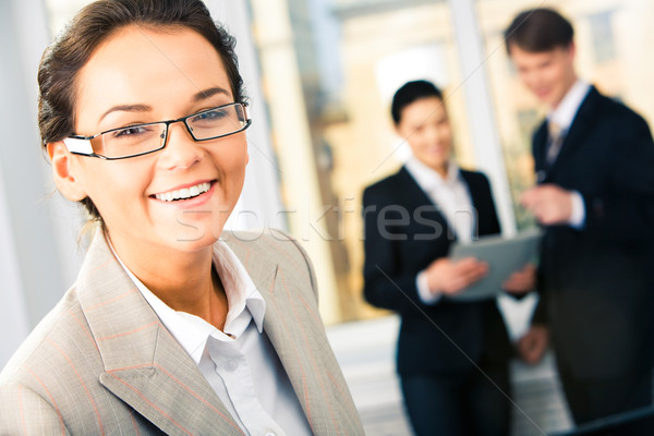 Okos nő portré üzletasszony szemüveg néz kamera Stock fotó © pressmaster