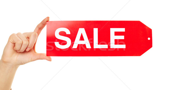 Tonen verkoop tag vrouwelijke hand Stockfoto © pressmaster