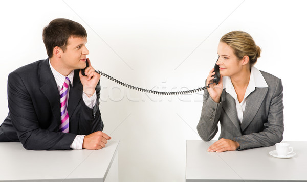 Tárgyalás portré üzleti partnerek beszél telefon néz Stock fotó © pressmaster