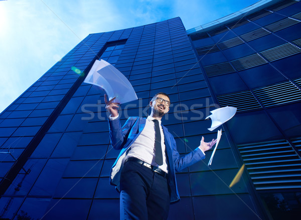 Businessman with papers Stock photo © pressmaster