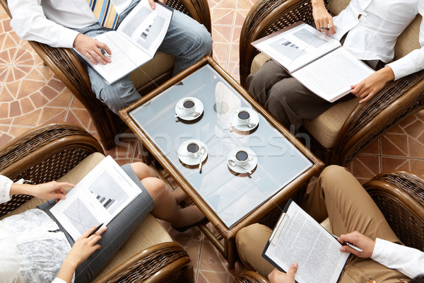 Sitzung Bild Geschäftsmann Sitzung Sessel halten Stock foto © pressmaster