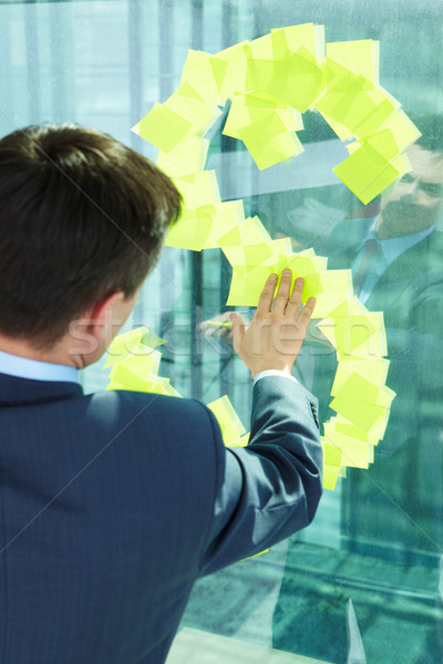 Man by window Stock photo © pressmaster