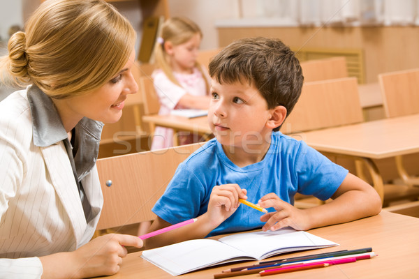 Lecke fotó tanár iskolás fiú ül együtt Stock fotó © pressmaster
