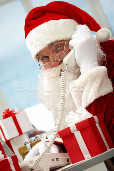 Noel baba fotoğraf meşgul yüz kutu Stok fotoğraf © pressmaster