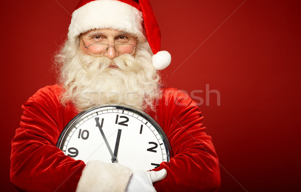 Santa with clock Stock photo © pressmaster