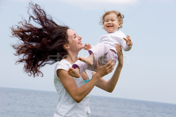 играет ребенка радостный женщины прелестный Сток-фото © pressmaster