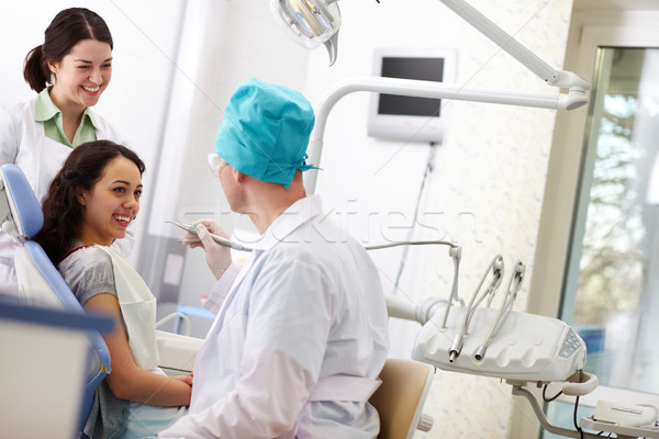 Foto stock: Atendimento · odontológico · alegre · paciente · amigável · médico · assistente