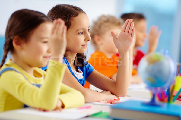 Felemelt kezek gyerekek kezek tudomás válasz gyerekek Stock fotó © pressmaster