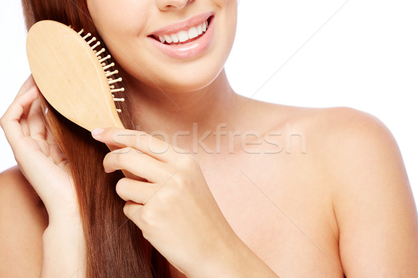 Haarverzorging jonge vrouw lang haar gelukkig vrouwelijke Stockfoto © pressmaster
