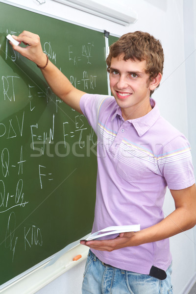 Fizika zseni portré okos legény iskolatábla Stock fotó © pressmaster