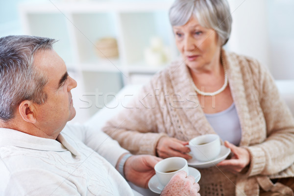 серьезный разговор портрет зрелый человек жена питьевой Сток-фото © pressmaster