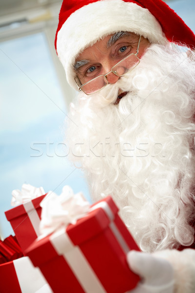 Santa with giftbox Stock photo © pressmaster