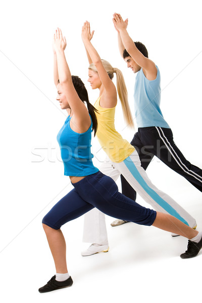 Gimnastyka portret młodych ludzi wykonywania Zdjęcia stock © pressmaster
