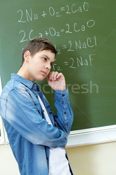 Boy at blackboard Stock photo © pressmaster