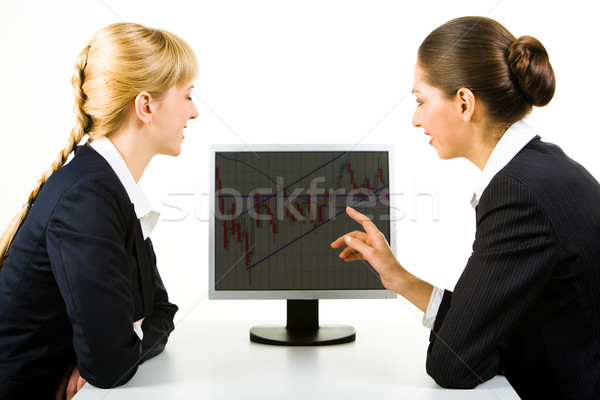 Mutat monitor fotó kettő üzletasszonyok ül Stock fotó © pressmaster
