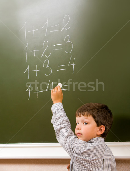 Portret zamyślony stałego tablicy dziecko edukacji Zdjęcia stock © pressmaster
