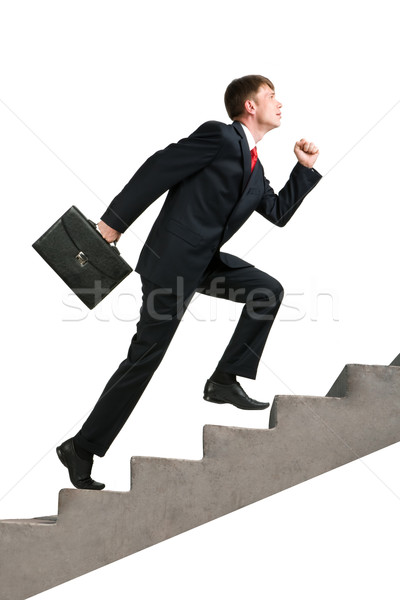Sukces obraz biznesmen teczki spaceru na górze Zdjęcia stock © pressmaster