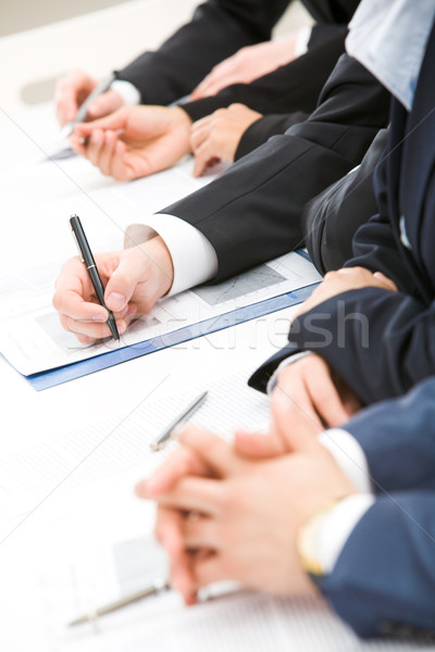 Stockfoto: Papier · werk · afbeelding · rij · mensen · handen