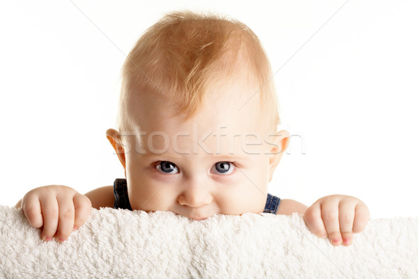 Cara curioso bebê fora conselho Foto stock © pressmaster