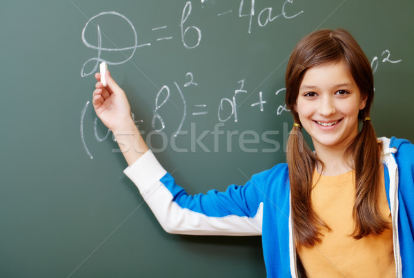 Magyaráz diák mutat képlet iskolatábla algebra Stock fotó © pressmaster