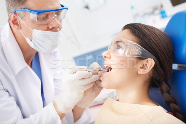 Zahnhygiene junge Mädchen öffnen Mund mündliche Frau Stock foto © pressmaster