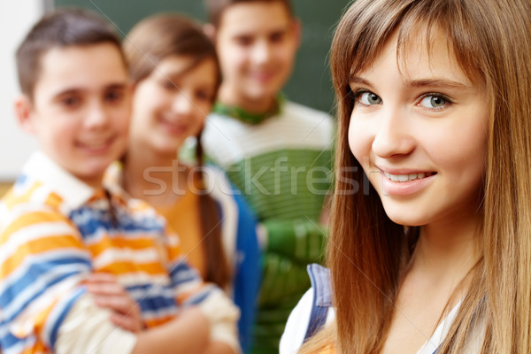 Güzel kız öğrenci bakıyor kamera mutlu Stok fotoğraf © pressmaster