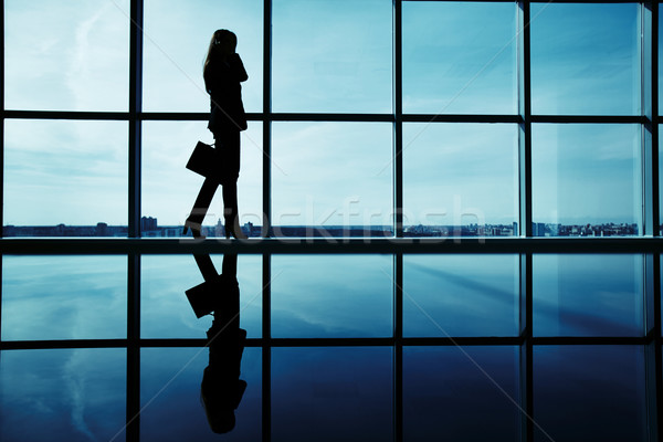 Businesswoman calling Stock photo © pressmaster