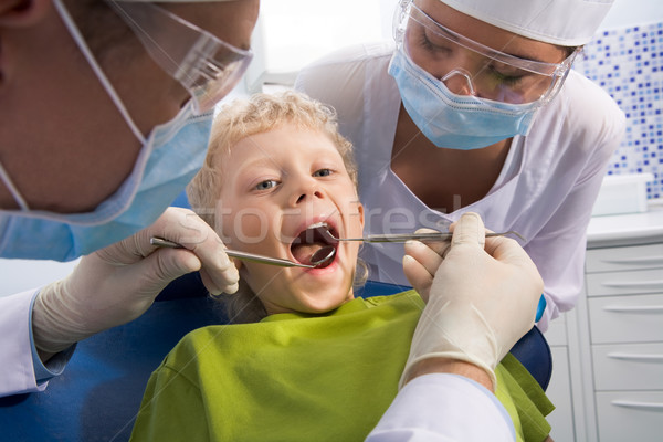 Inspekcja ustny jama stomatologicznych mały chłopca Zdjęcia stock © pressmaster