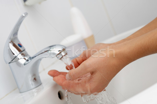 Hands in water Stock photo © pressmaster
