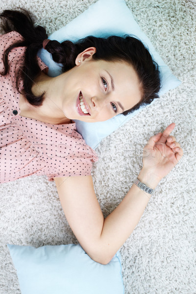 Kényelem fiatal lány otthon néz kamera boldog Stock fotó © pressmaster